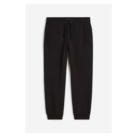 H & M - THERMOLITE® Kalhoty jogger Relaxed Fit - černá H&M