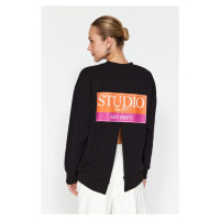Trendyol Black With Print Detail on the Back, Fleece Inside Regular Fit Knitted Sweatshirt with 