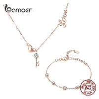 Stříbrný set pozlacený náhrdelník a náramek s přívěsky LOAMOER