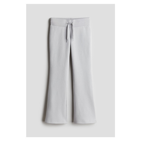 H & M - Kalhoty jogger Flared - šedá H&M