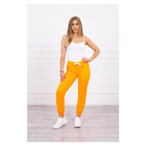 Bavlněné kalhoty oranžové neon Kesi