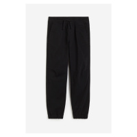 H & M - Bavlněné kalhoty jogger - černá