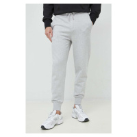 Bavlněné tepláky Calvin Klein Jeans šedá barva