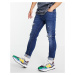 ASOS DESIGN skinny jeans in dark wash with rips-Blue