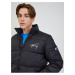 Černá pánská prošívaná bunda Tommy Jeans Signature Puffer