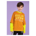 Dětská bavlněná košile s dlouhým rukávem Coccodrillo žlutá barva, s potiskem