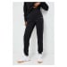 Tréninkové kalhoty Fila Rangiroa černá barva, hladké, FAW0503