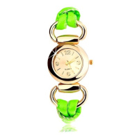 Analogové hodinky, kulatý ciferník zlaté barvy, latexový zelený řemínek