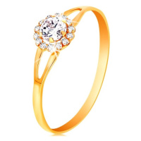 Prsten ve žlutém 14K zlatě - zářivý kvítek z čirých zirkonů, výřezy na ramenech