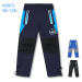Chlapecké šusťákové kalhoty, zateplené - KUGO K6972, jasně modrá Barva: Modrá světle