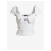 Bílé dámské žebrované cropped tričko s mašlí Guess Valeriana
