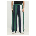 Tepláky Reebok LTD Paneled Track Pants tmavomodrá barva, vzorované, RMCJ00CC99FAB0014652