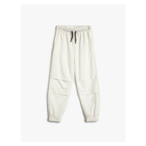 Koton Basic Jogger Sweatpants with Tie Waist, Pockets, Tile Detail.