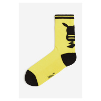 H & M - Ponožky's motivem - žlutá