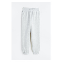H & M - Teplákové kalhoty z bavlněné směsi - šedá