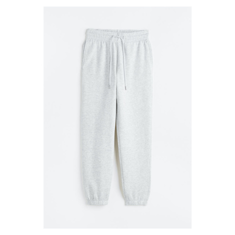 H & M - Teplákové kalhoty z bavlněné směsi - šedá H&M