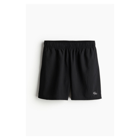 H & M - Tkané sportovní šortky z DryMove™ s kapsami - černá H&M