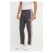 Tepláky adidas Originals Manchester United Beckenbauer Track Pant šedá barva, s aplikací, IY0044