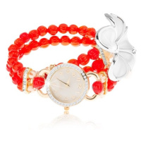 Analogové hodinky, korálkový červený náramek, ciferník se zirkony, bílý květ