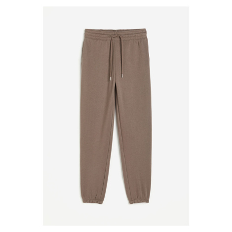 H & M - Teplákové kalhoty z bavlněné směsi - béžová H&M