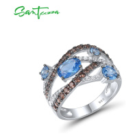 Stříbrný prsten s propletením zdobený kamínky FanTurra