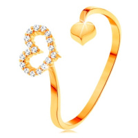 Zlatý prsten 585 - zvlněná ramena ukončená obrysem srdce a plným srdíčkem