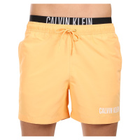 Pánské plavky Calvin Klein oranžové (KM0KM00992-SAN)