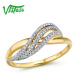 Elegantní zlatý prsten s propletením zdobený diamanty
