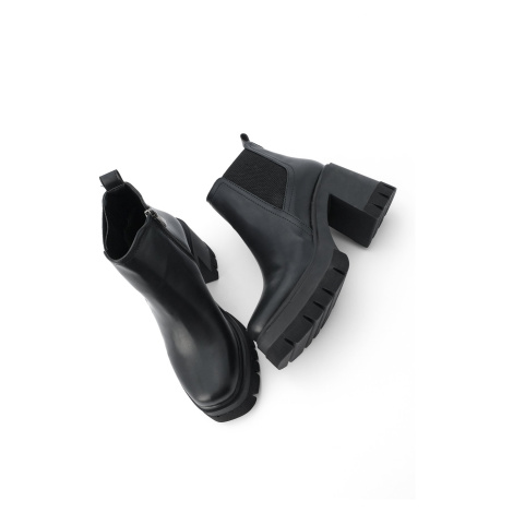 Dámské černé boty na podpatku se zipem a elastickým detailem Marjin Veros.