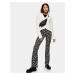 Topshop floral print flared trousers in monochrome-Brown