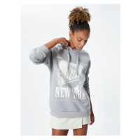 Koton Hooded Sweatshirt with a slogan printed, relaxed fit and long sleeve.