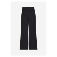 H & M - Sportovní kalhoty Flared z materiálu DryMove™ - černá