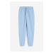 H & M - Teplákové kalhoty z bavlněné směsi - modrá