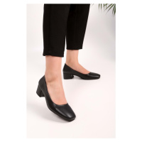 Shoeberry Women's Tria Black Skin Heeled Shoes
