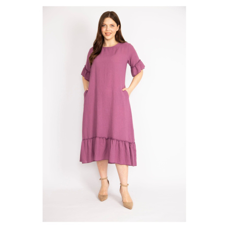 Šans dámské fialové tkané šaty se zadními šněrováním a volánky na lemu a manžetách. Şans