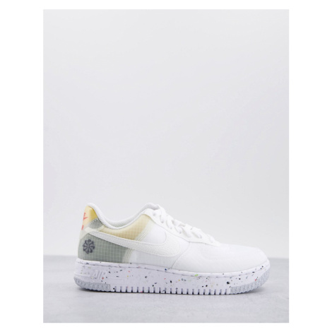 Nike Air Force 1 Crater trainers in white and orange
