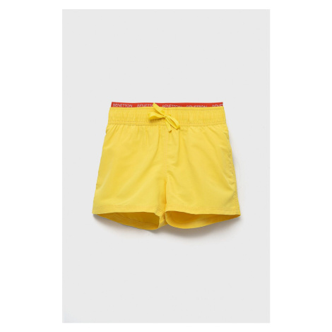 Dětské plavkové šortky United Colors of Benetton žlutá barva
