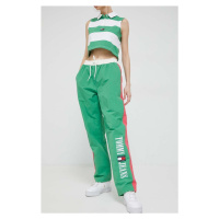 Tepláky Tommy Jeans zelená barva, vzorované