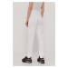 Kalhoty Puma 585825 dámské, bílá barva, s potiskem