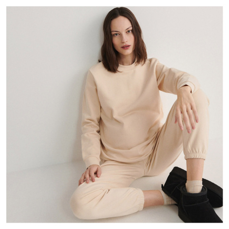 Béžové těhotenské kalhoty