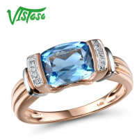 Zlatý prsten s texturou a modrým topazem Listese
