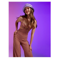 Koton A Spanish Leg Jumpsuit with a Patterned Window Detail.