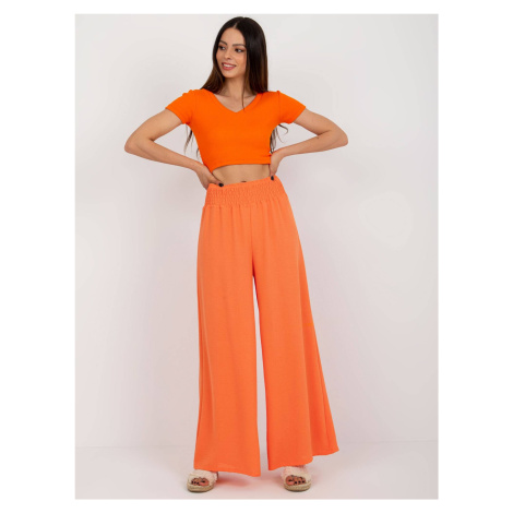 Oranžové široké dámské kalhoty s gumou v pase (8390) Factory Price