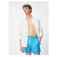 Koton Short Marine Shorts with Pineapple Print. A drawstring waist with pocket.