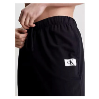 Spodní prádlo Pánské kalhoty SLEEP PANT 000NM2611EUB1 - Calvin Klein
