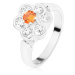 Prsten ve stříbrném odstínu, blýskavý čirý kvítek s oranžovým středem