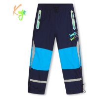 Chlapecké šusťákové kalhoty, zateplené - KUGO DK7127, tmavě modrá Barva: Modrá tmavě