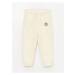 LC Waikiki Baby Boy Jogger Tracksuit Bottoms with an Elastic Printed Waist.