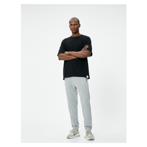 Koton Jogger Sweatpants with Lace Waist Stitching Detail and Zipper Pocket