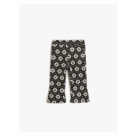 Koton Floral Wide Leg Leggings with a slit detail at the elastic waist.